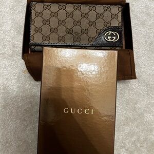 Gucci Tan and Black Monogram Clutch